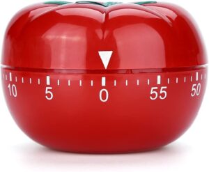 Timer vermelho em forma de tomate vermelho, como o usado por Francesco Chirillo para inventar a técnica Pomodoro